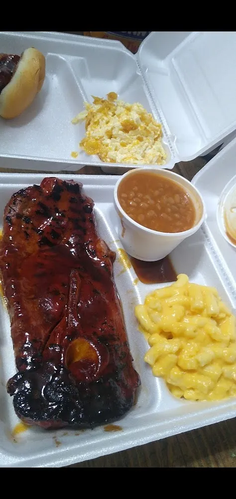 Pork Steak Plate with Baked Beans and Mac N' Cheese
